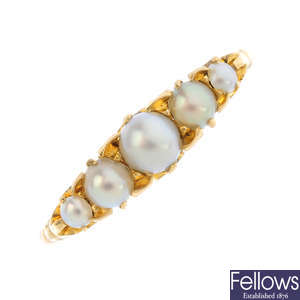 An Edwardian 18ct gold split pearl ring.