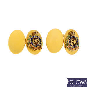 GARRARD - a pair of 1970s 9ct gold enamel regimental cufflinks.