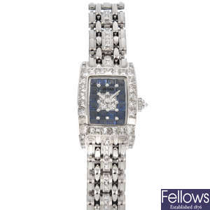 JAHAN - a diamond and sapphire wrist watch.