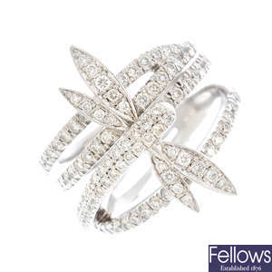 BOODLES & DUNTHORNE - an 18ct gold diamond dragonfly ring.