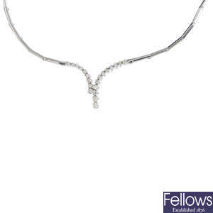 An 18ct gold diamond necklace. known weight 0.50ct total