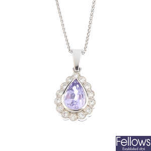 A sapphire and diamond cluster pendant, with chain.