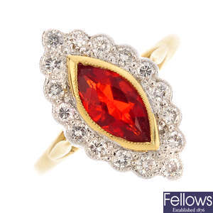 An 18ct gold fire opal and diamond cluster ring.