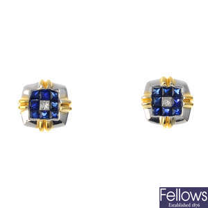 A pair of diamond and sapphire earrings.