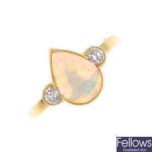 An 18ct gold opal and diamond three-stone ring.
