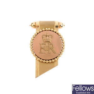 CARTIER - a mid 20th century 9ct gold Royal Cypher brooch.