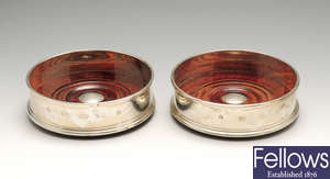 A pair of modern silver mounted wine coasters.