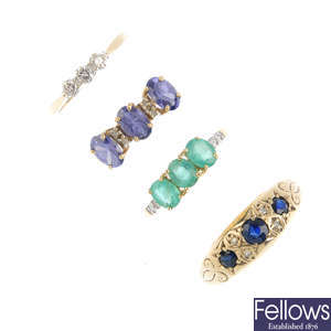 Four gem-set dress rings.