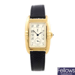 YVES SAINT LAURENT - a gentleman's gold plated wrist watch.