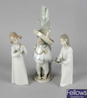 A group of Lladro and other porcelain figures