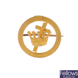 An early 20th century 15ct gold religious brooch.