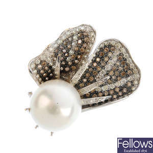 A cultured pearl, 'coloured' diamond and diamond ring.