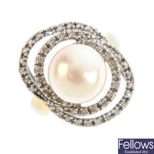 A diamond and cultured pearl dress ring.