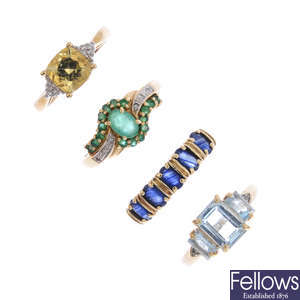 Four 9ct gold gem-set dress rings.