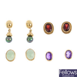 Twelve pairs of gem-set earrings.