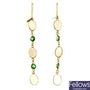 A pair of opal and green garnet earrings.