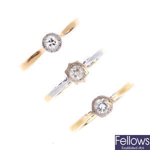 Three gold diamond single-stone rings.