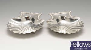 A pair of early Victorian silver shell butter dishes.