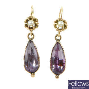 A pair of late 19th century amethyst and seed pearl earrings.