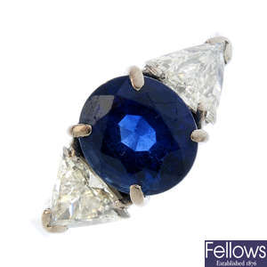 An 18ct gold diamond and sapphire three-stone ring.  