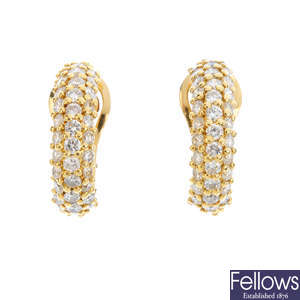 CARTIER - a pair of 18ct gold diamond earrings.