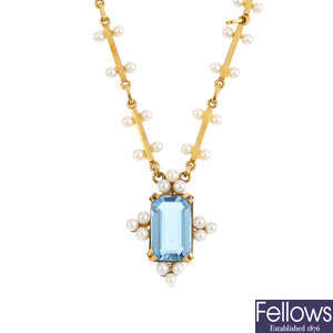 An 18ct gold aquamarine and seed pearl necklace.