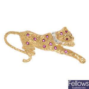 A 9ct gold ruby and diamond leopard brooch.