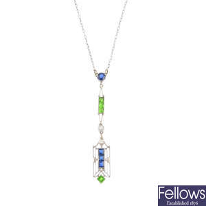 An Art Deco platinum, demantoid garnet, diamond and sapphire necklace.