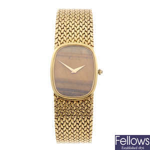 KUTCHINSKY - a lady's 18ct gold bracelet watch.