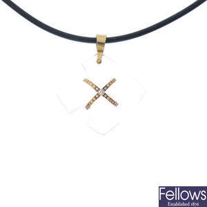 BACCARAT - a diamond and glass cross pendant, on cord.