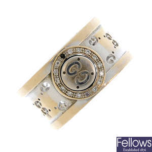 GUCCI - an 18ct gold diamond 'Icon Twirl' ring.