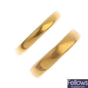 Two 22ct gold band rings.