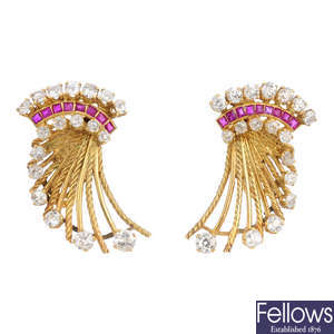 A pair of mid 20th century gold diamond and ruby earrings.