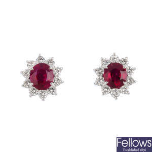 A pair of Burmese ruby and diamond cluster earrings.