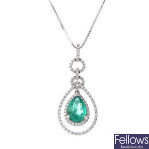 An 18ct gold emerald and diamond pendant, with chain.