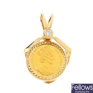 A gold diamond pendant.
