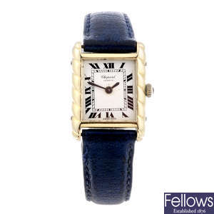 CHOPARD - a lady's yellow metal wrist watch.