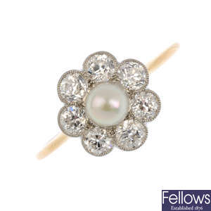 A cultured pearl and diamond cluster ring.