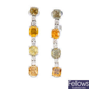 A pair of diamond and variously coloured diamond earrings.