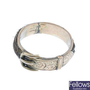 A late Victorian 9ct gold woven hair buckle memorial ring.
