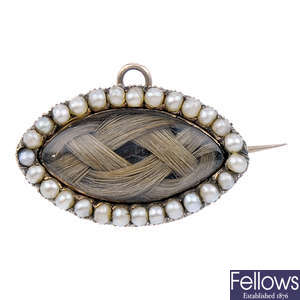 A mid Victorian split pearl memorial brooch.