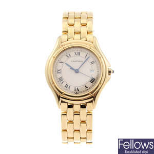 CARTIER - an 18ct yellow gold Cougar bracelet watch.