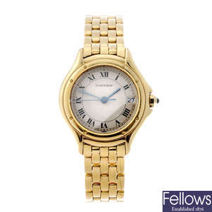 CARTIER - an 18ct yellow gold Cougar bracelet watch.