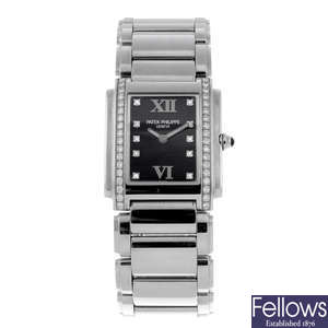 PATEK PHILIPPE - a lady's stainless steel Twenty-4 bracelet watch.