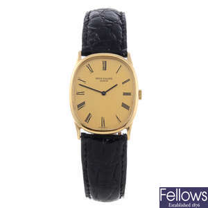 PATEK PHILIPPE - a gentleman's yellow metal Ellipse wrist watch.