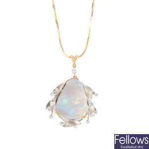 An opal and diamond pendant, with 18ct gold chain.