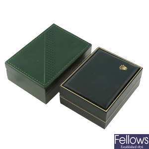 ROLEX - a group of three inner boxes with assorted outer boxes, wallets and booklets
