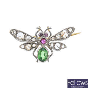 A diamond and gem-set insect brooch.