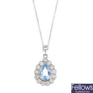 An aquamarine and diamond pendant with chain.