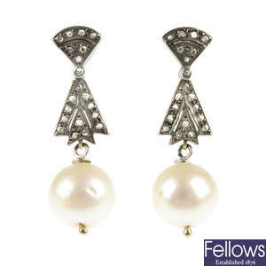 A pair of diamond and cultured pearl earrings. 